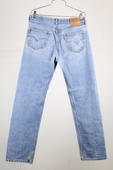 501 light wash levi's denim jeans with five button closure
