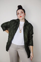 Women's vintage 1970's White Stag, USA label long sleeve olive green nylon quilted puffer jacket with silver zipper up the front