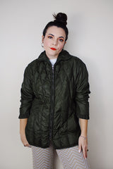 Women's vintage 1970's White Stag, USA label long sleeve olive green nylon quilted puffer jacket with silver zipper up the front