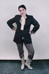 Women's or men's western style vintage 1970's Levi's Western Wear, San Francisco label long sleeve dark chocolate brown polyester blazer with two button closure.