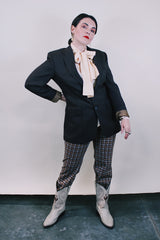 Women's or men's western style vintage 1970's Levi's Western Wear, San Francisco label long sleeve dark chocolate brown polyester blazer with two button closure.