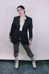 Women's or men's western style vintage 1970's Levi's Western Wear, San Francisco label long sleeve dark chocolate brown polyester blazer with two button closure.