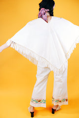 1970's cream colored fringed poncho and pant set with floral and bird embroidery