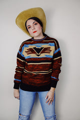 vintage 1970's Montgomery Ward long sleeve acrylic material pullover sweater with a brown, maroon, tan, and blue all over print