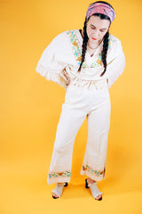 1970's cream colored fringed poncho and pant set with floral and bird embroidery