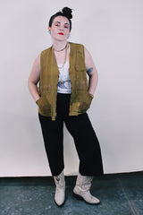 Men's vintage 1950's Bullseye Bill label sleeveless brownish green hunting vest with brass rapid zipper, multiple pockets and compartments and wide arm holes.