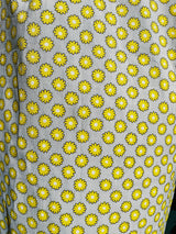 sleeveless mid length shift dress with tie neck grey with yellow floral print vintage 1960's