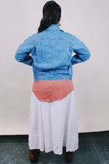 Women's or men's vintage western style 1970's Britannia Sportswear label long sleeve medium wash denim zip up jacket with chest pockets, side pockets, and contrast stitching