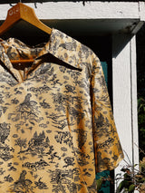 short sleeve gold silky printed dress knee length vintage 1960's with collar and v neck