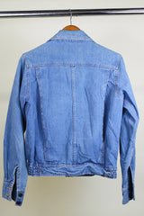 Women's or men's vintage western style 1970's Britannia Sportswear label long sleeve medium wash denim zip up jacket with chest pockets, side pockets, and contrast stitching