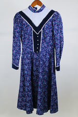 Women's vintage western style 1970's Candi Jones California label long sleeve midi length prairie dress in navy cotton material with all over ditsy floral print.