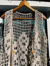 sleeveless cream crochet vest with beaded trim details vintage 1970's