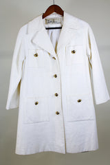 Women's vintage 1960's Lilli Ann, Paris & San Francisco label 3/4 arm length long length cream colored vinyl polyester coat with big round gold buttons and four front pockets
