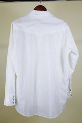Women's or men's western style vintage 1970's Ely Plains, Since 1978 label long sleeve white button up shirt with pockets, collar, and pearl snapper buttons.