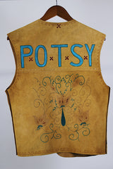 Women's or men's western style vintage 1970's sleeveless brown tan colored suede vest with all over teal colored hand painting.