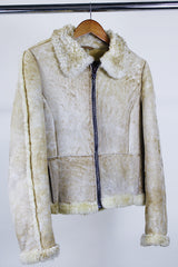 Women's or men's western style vintage 1970's Knight Tailors LTD label long sleeve short length cream colored suede jacket with shearling liner and trim.