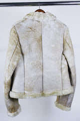 Women's or men's western style vintage 1970's Knight Tailors LTD label long sleeve short length cream colored suede jacket with shearling liner and trim.