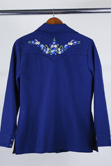 Women's vintage western style 1970's California Ranchwear label long sleeve navy blue blouse with pointy collar and pearly blue popper buttons. Has floral embroidery on shoulders.
