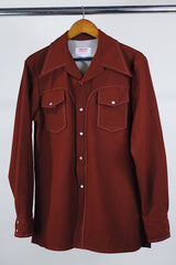 Men's vintage 1970's Time Out West by Farah, Made in USA label long sleeve maroon colored polyester western style shirt with pearl popper buttons and white contrast stitching.