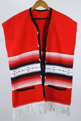 Women's or men's vintage boho western style 1970's sleeveless red wool vest with black trim, cream fringe trim on hem, and black and cream stripes.
