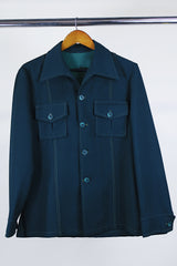 Women's or men's vintage western style 1970's dark forest green polyester two piece suit and jacket suit. Light green contrast thread throughout.