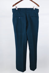 Women's or men's vintage western style 1970's dark forest green polyester two piece suit and jacket suit. Light green contrast thread throughout.