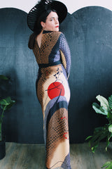 Women's vintage 1970's Tori Richard Honolulu for Liberty House, Made in USA label long sleeve maxi length polyester material all over printed dress with deep V shaped neckline.