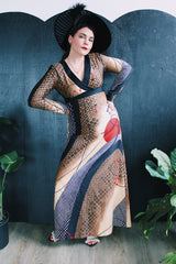 Women's vintage 1970's Tori Richard Honolulu for Liberty House, Made in USA label long sleeve maxi length polyester material all over printed dress with deep V shaped neckline.