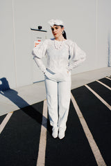 Women's retro vintage 1990's long sleeve white lace blouse with big puff sleeves and buttons in the back