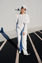 Women's retro vintage 1990's long sleeve white lace blouse with big puff sleeves and buttons in the back
