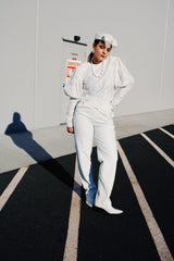 Women's retro vintage 1990's long sleeve white lace blouse with big puff sleeves and buttons in the back