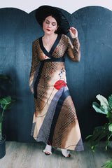 Women's vintage 1970's Tori Richard Honolulu for Liberty House, Made in USA label long sleeve maxi length polyester material all over printed dress with deep V shaped neckline.