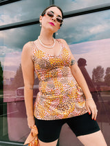 sleeveless one piece bathing suit in pink orange and yellow paisley print with skirt over bottom vintage 1970's