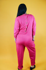 long sleeve hot pink jumpsuit with jewels around neckline and cuffs vintage 1980's