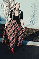 Women's vintage 1980's Malbe label maxi length high waisted plaid print skirt in a black, white, red, and gold metallic plaid print