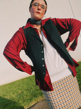 Men's vintage 1970's JCPenney Towncraft label long sleeve button up shirt with a pointy collar in maroon colored lightweight polyester material with white contrast stitching and a left chest pocket.