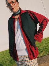 Men's vintage 1970's JCPenney Towncraft label long sleeve button up shirt with a pointy collar in maroon colored lightweight polyester material with white contrast stitching and a left chest pocket.