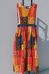 yellow red brown and black printed sleeveless ankle length apron pinafore dress vintage 1970's