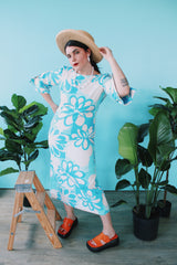 Women's vintage 1970's Polynesian Casuals, Honolulu 3/4 arm length midi length blue and white Hawaiian print dress in cotton material with cut out details on sleeves.