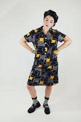 short sleeve knee length black printed polyester shirt dress with collar vintage 1970's