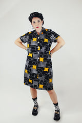 short sleeve knee length black printed polyester shirt dress with collar vintage 1970's