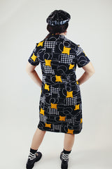 short sleeve knee length black printed polyester shirt dress with collar vintage 1970's