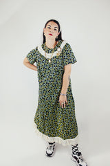 short sleeve ankle length black green and yellow floral printed dress with white eyelet trim vintage 1960's