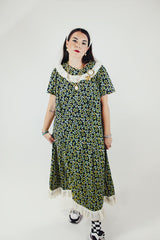 short sleeve ankle length black green and yellow floral printed dress with white eyelet trim vintage 1960's