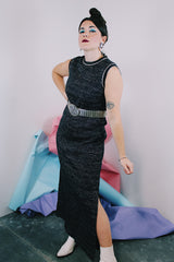 Women's vintage 1970's sleeveless ankle length dress in black with all over silver metallic thread.