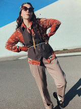 Men's or women's vintage 1970's Sears, The Men's Store label long sleeve button up shirt with a pointy collar in polyester material and a brown, tan, and baby blue all over abstract print.