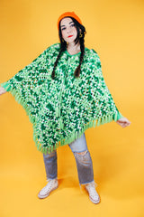 green crochet knit poncho with fringed hem vintage 1970's