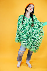 green crochet knit poncho with fringed hem vintage 1970's