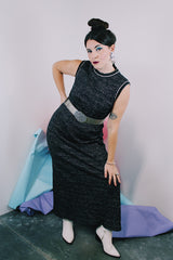 Women's vintage 1970's sleeveless ankle length dress in black with all over silver metallic thread.
