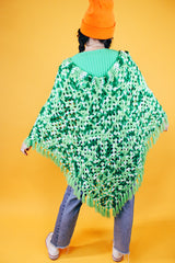 green crochet knit poncho with fringed hem vintage 1970's